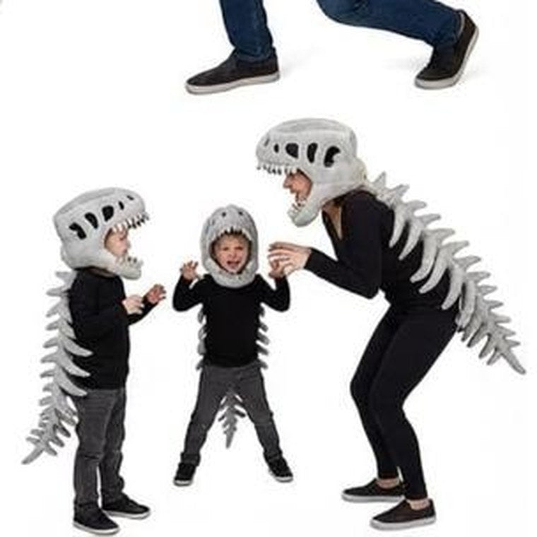 Family wearing the dinosaur skeleton sets together