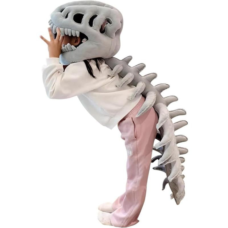 Kid size — child wearing the plush dino skeleton cape and skull hood, back view
