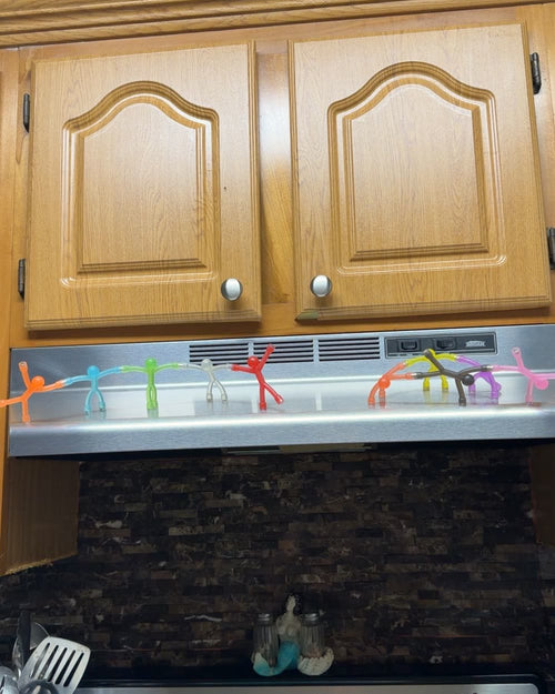 Customer photo of the bendy magnetic figures stuck on a fridge