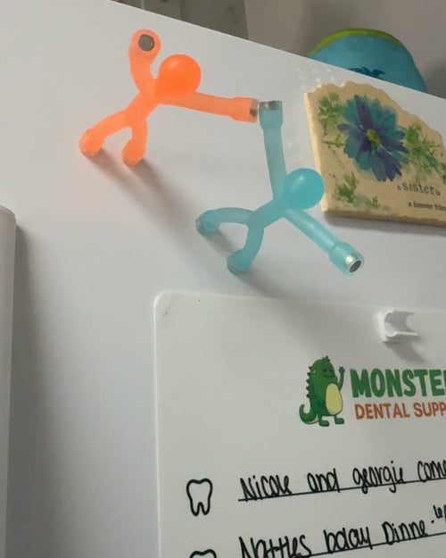Customer photo of the bendy magnetic figures stuck on a fridge