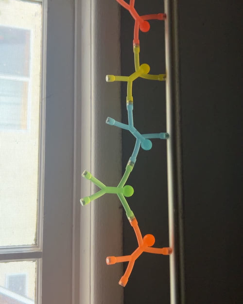 Customer photo of the bendy magnetic figures stuck on a fridge