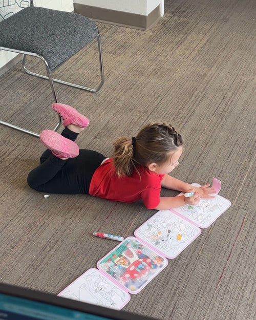 Customer photo of the reusable water painting books used by a child