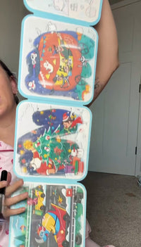 All four books unfolded and painted